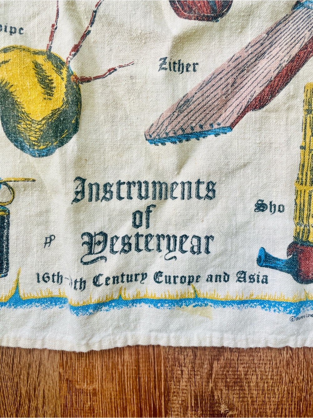 Instruments of Yesteryear Illustrated Tea Towel - Cream with Blue, Yellow, Red - Picture 3 of 5